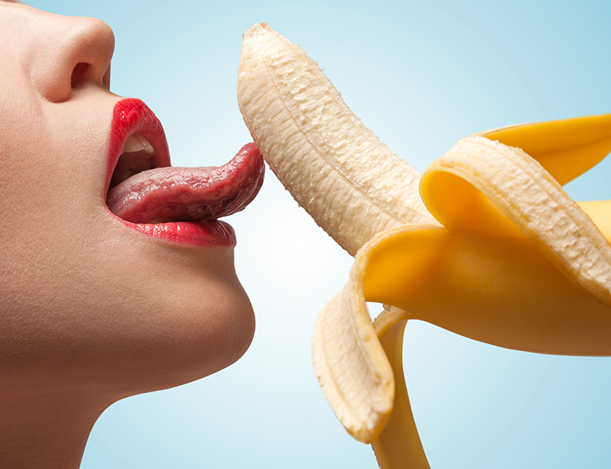 Woman Eating Banana
